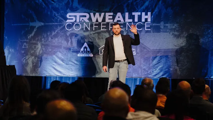 Ryan Bakke speaking on stage