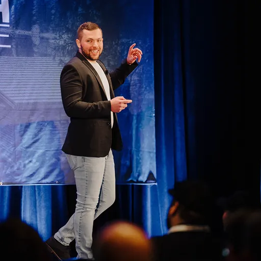 Ryan Bakke speaking on stage